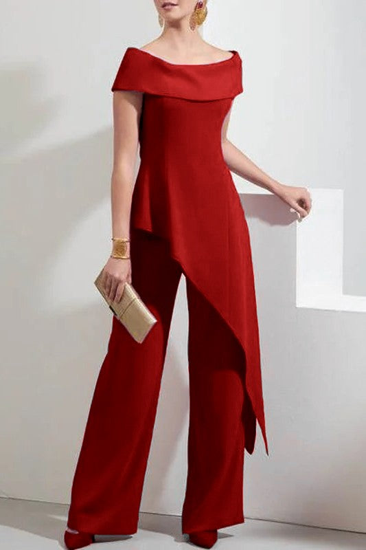 Elegante set composto da top e pantaloni asimmetrici, fucsia