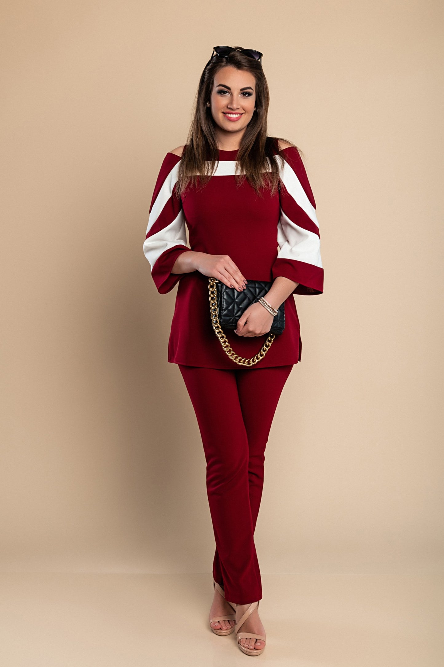 Competo elegante top con maniche a campana e pantaloni, nero