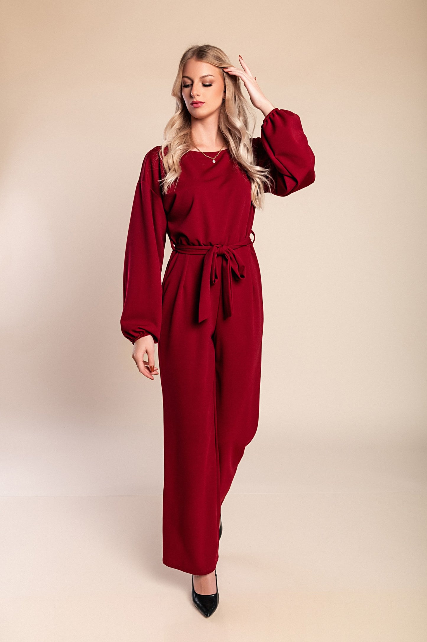 Tuta elegante a maniche lunghe, nera