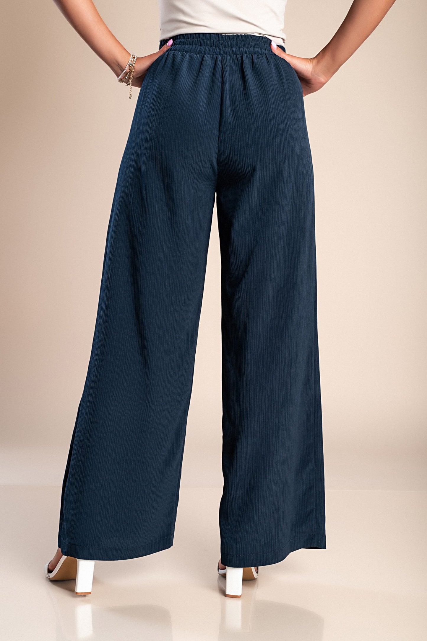 Pantaloni lunghi eleganti con bottoni, neri.