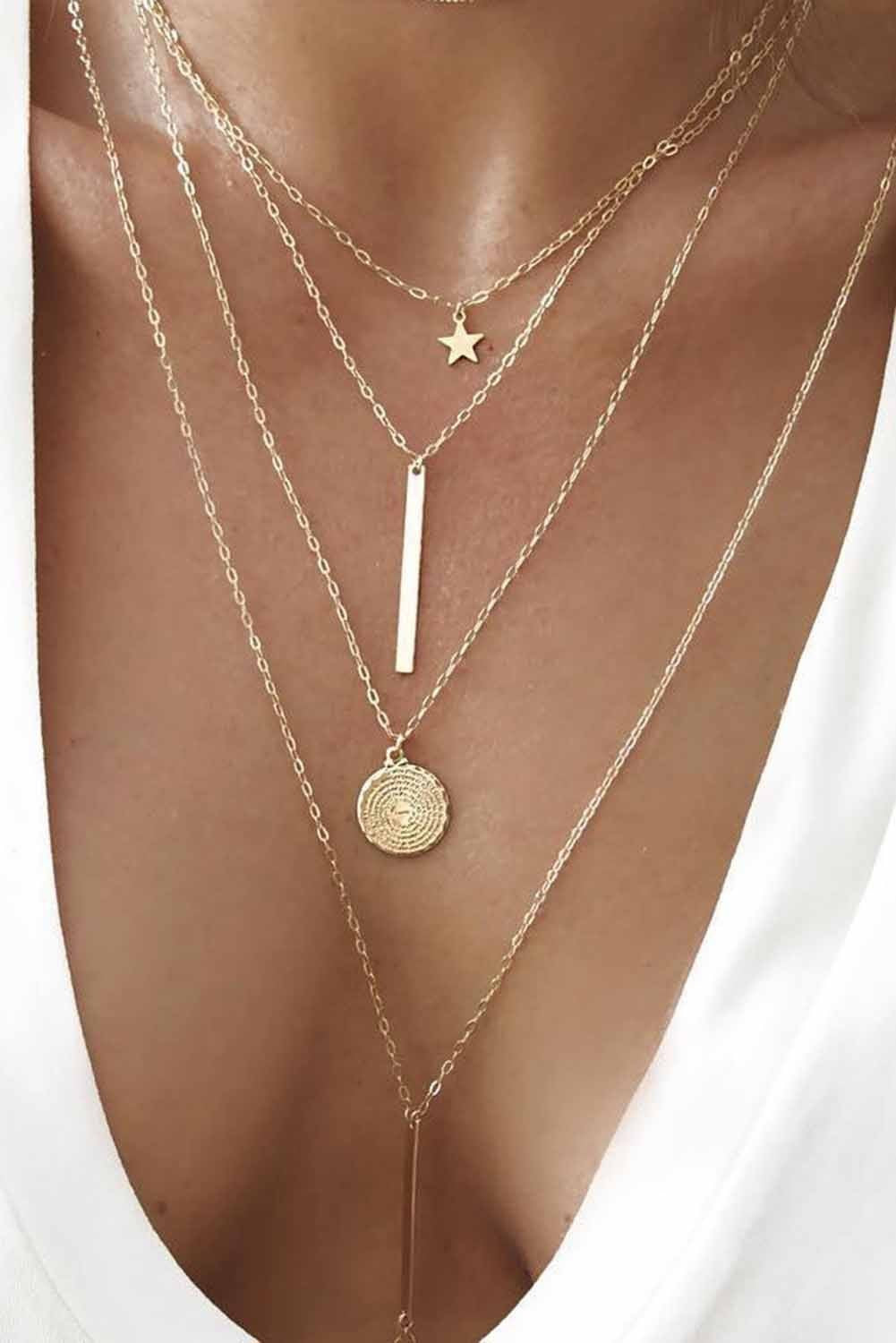 SET DI CATENE SOTTILI CON DIVERSI PENDENTI OAKLYNN, ORO
