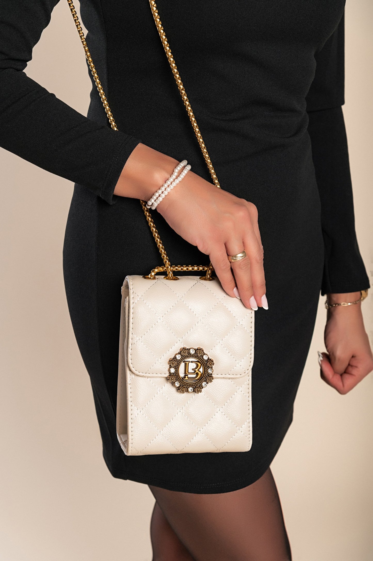 Elegante borsa a mano piccola con dettaglio trapuntato, bianca