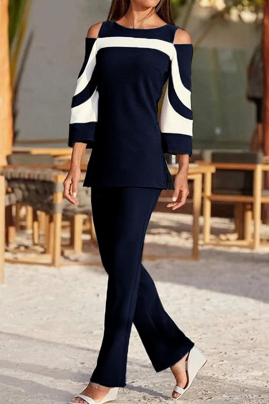 Competo elegante top con maniche a campana e pantaloni, nero