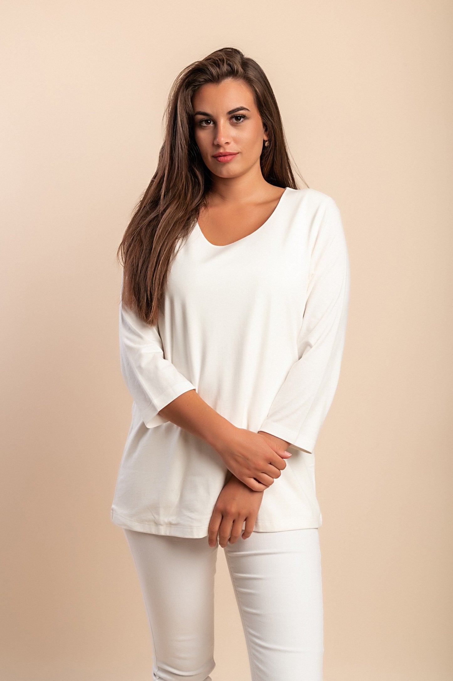 Top bianco con maniche a 3/4, taglia comoda