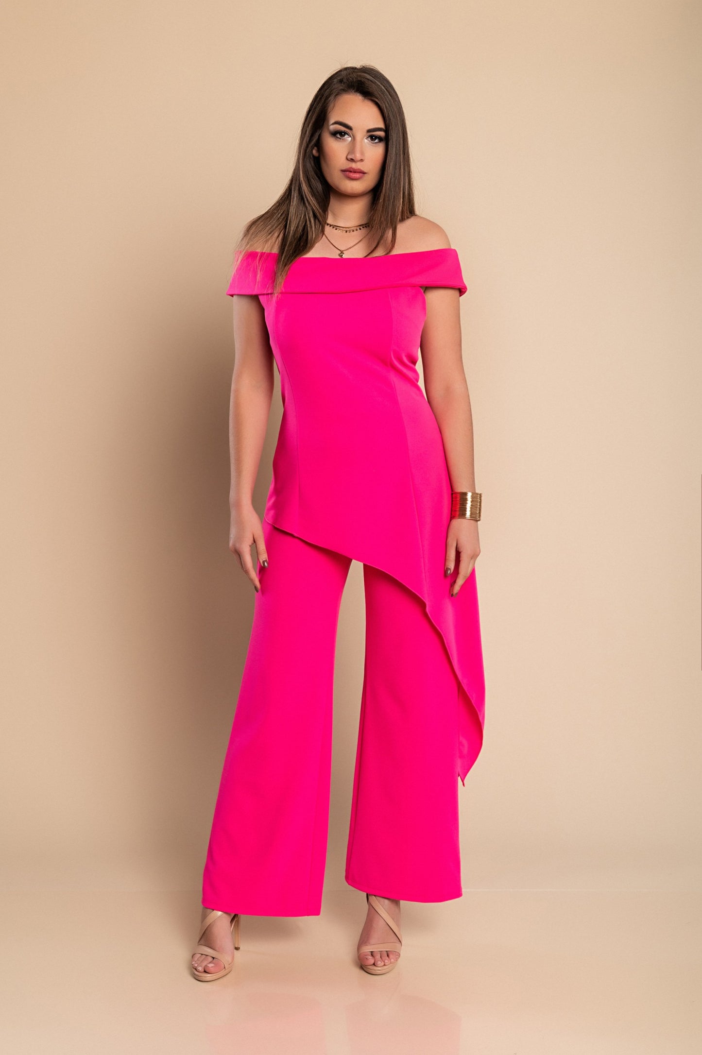 Elegante set composto da top e pantaloni asimmetrici, fucsia
