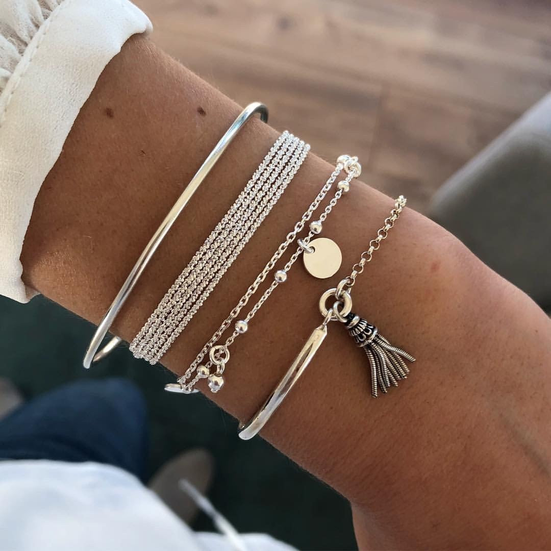 SET DI 4 BRACCIALI A VARIE FORME EVENNE, ARGENTO
