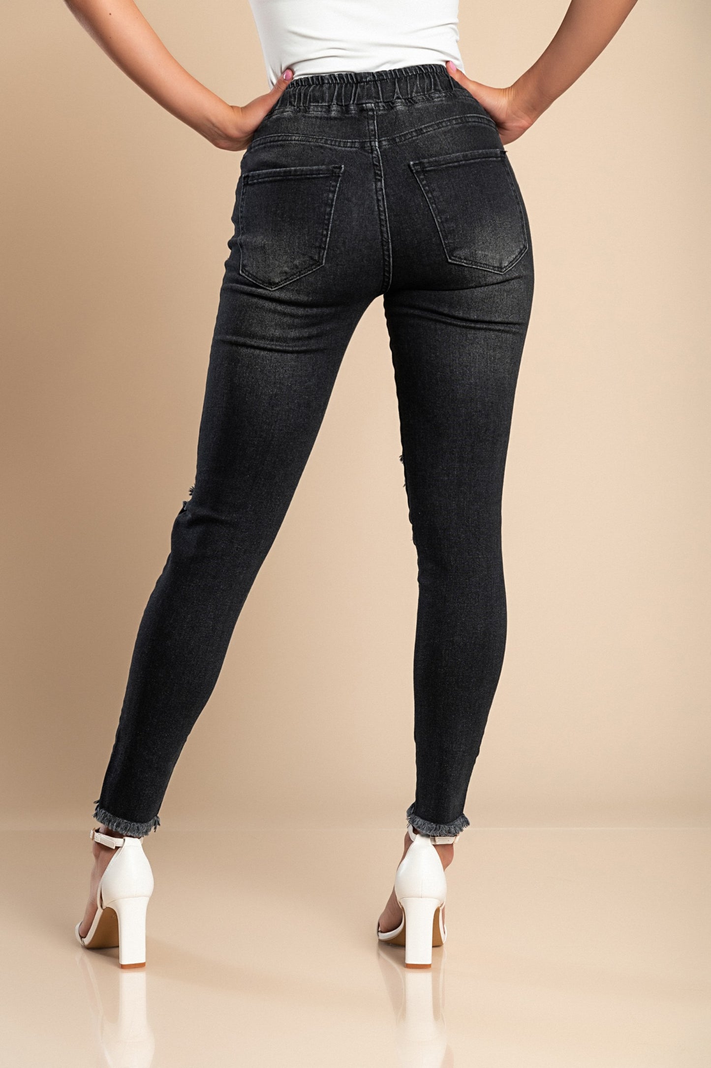 Jeans attillati a vita alta e spacchi Stefana, celeste