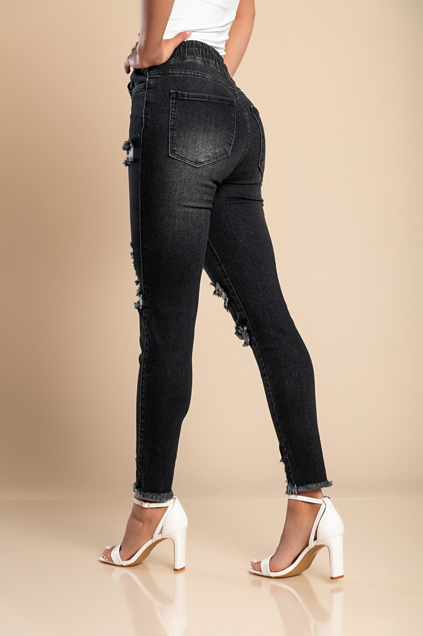 Jeans attillati a vita alta e spacchi Stefana, celeste