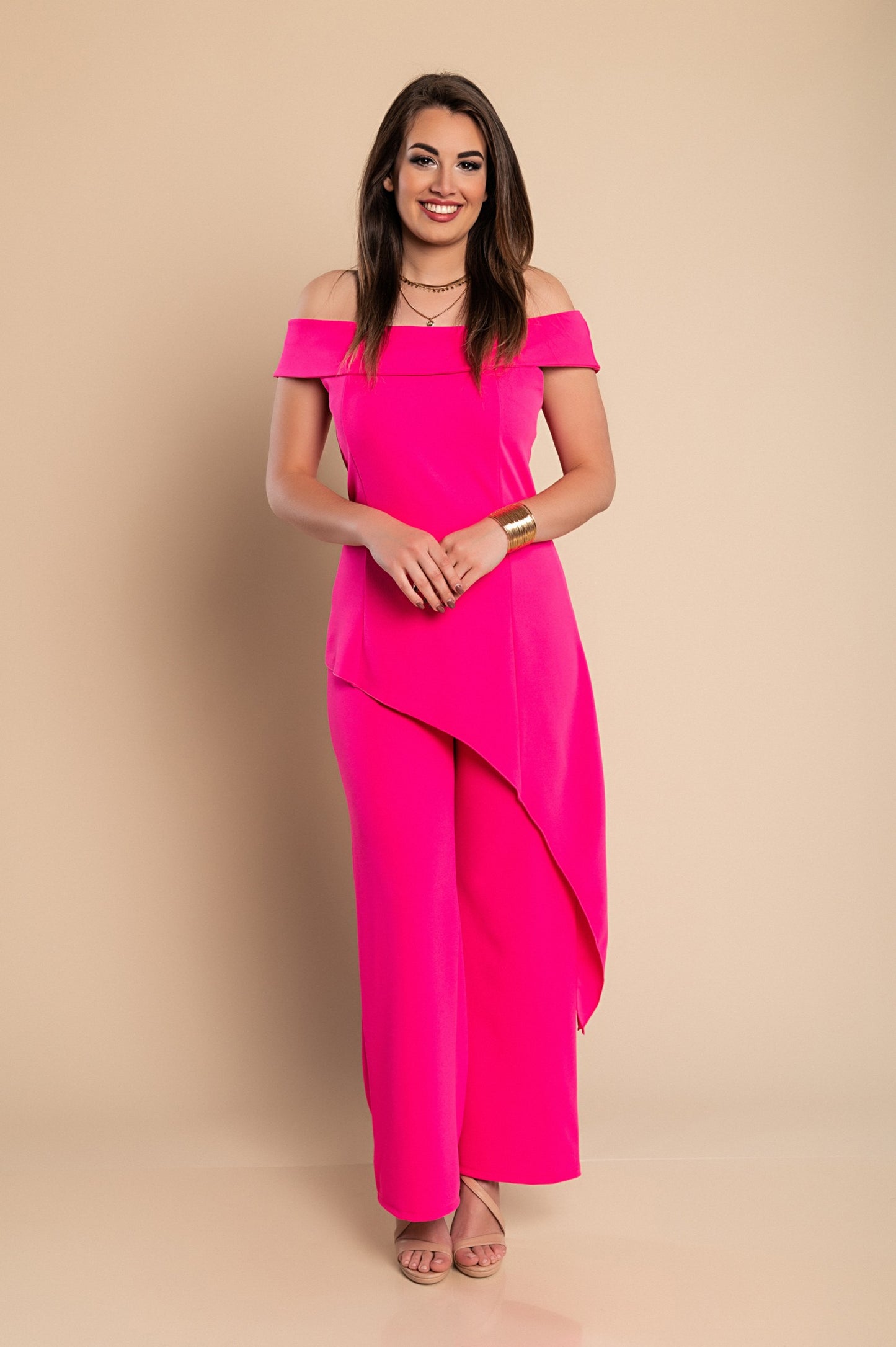 Elegante set composto da top e pantaloni asimmetrici, fucsia