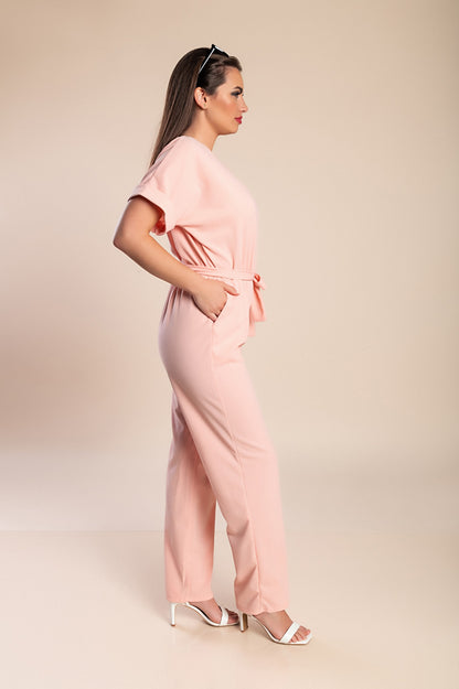 Tuta elegante con dettagli metallici, nera