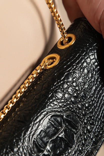 Borsa piccola con stampa pelle di coccodrillo, nera