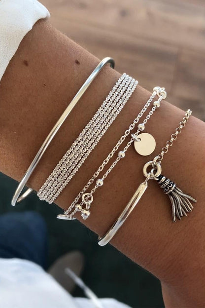 SET DI 4 BRACCIALI A VARIE FORME EVENNE, ARGENTO