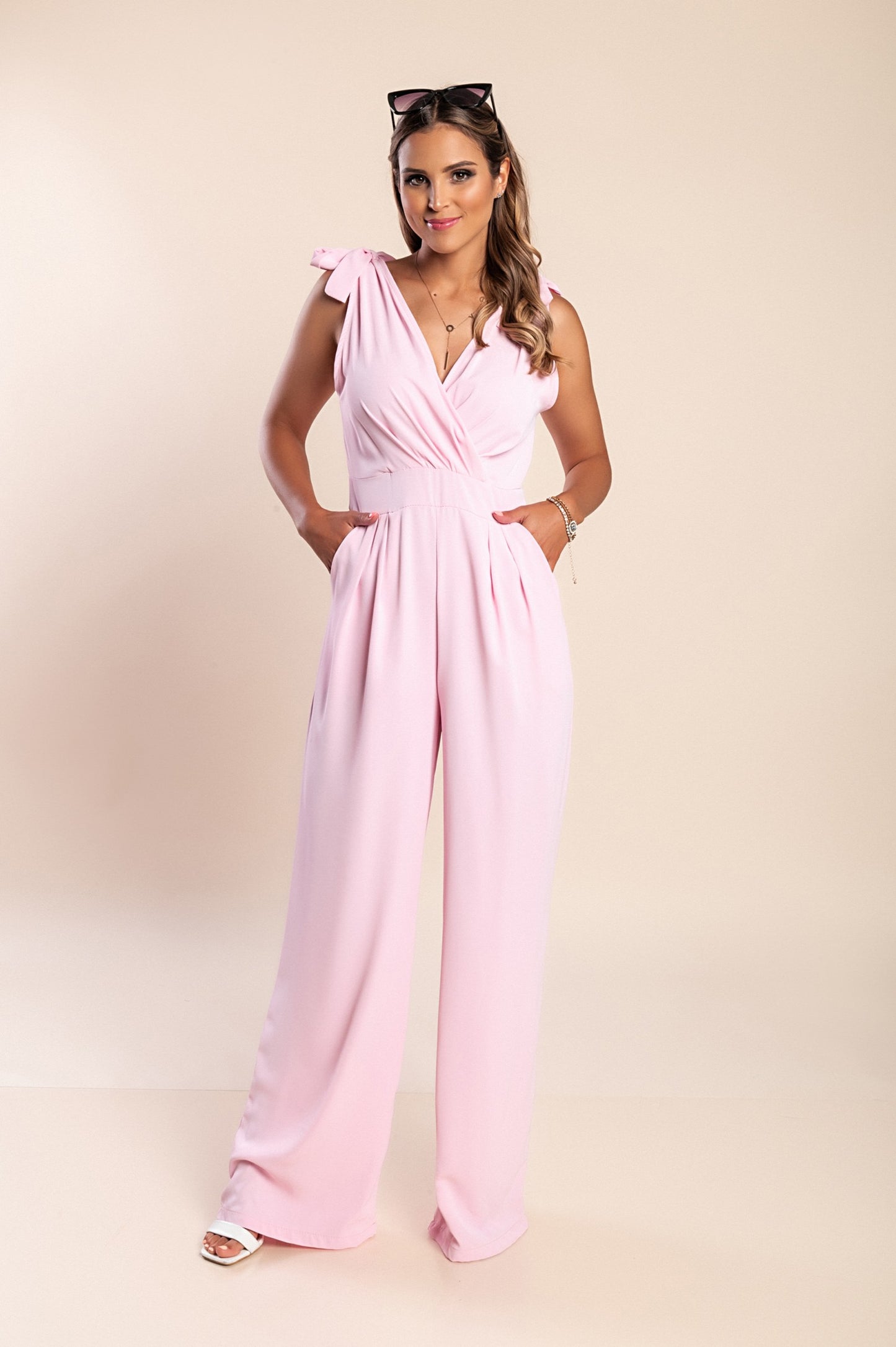 Tuta elegante senza maniche, colore rosa chiaro