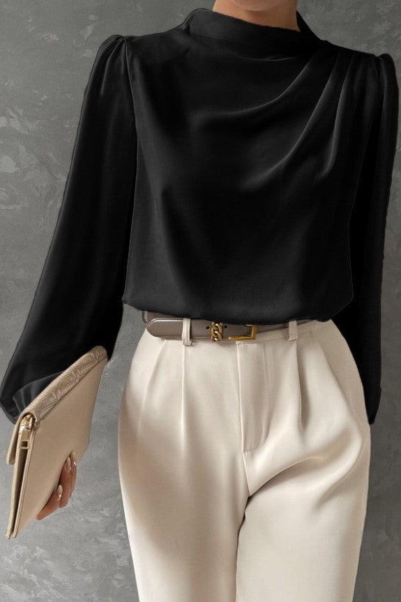 Elegante camicetta a collo alto, bianca