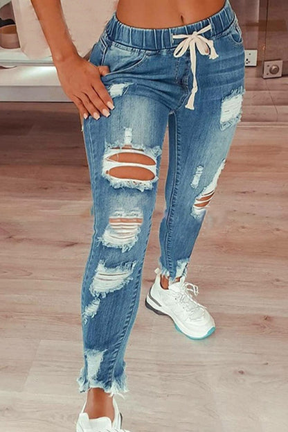 Jeans attillati a vita alta e spacchi Stefana, celeste