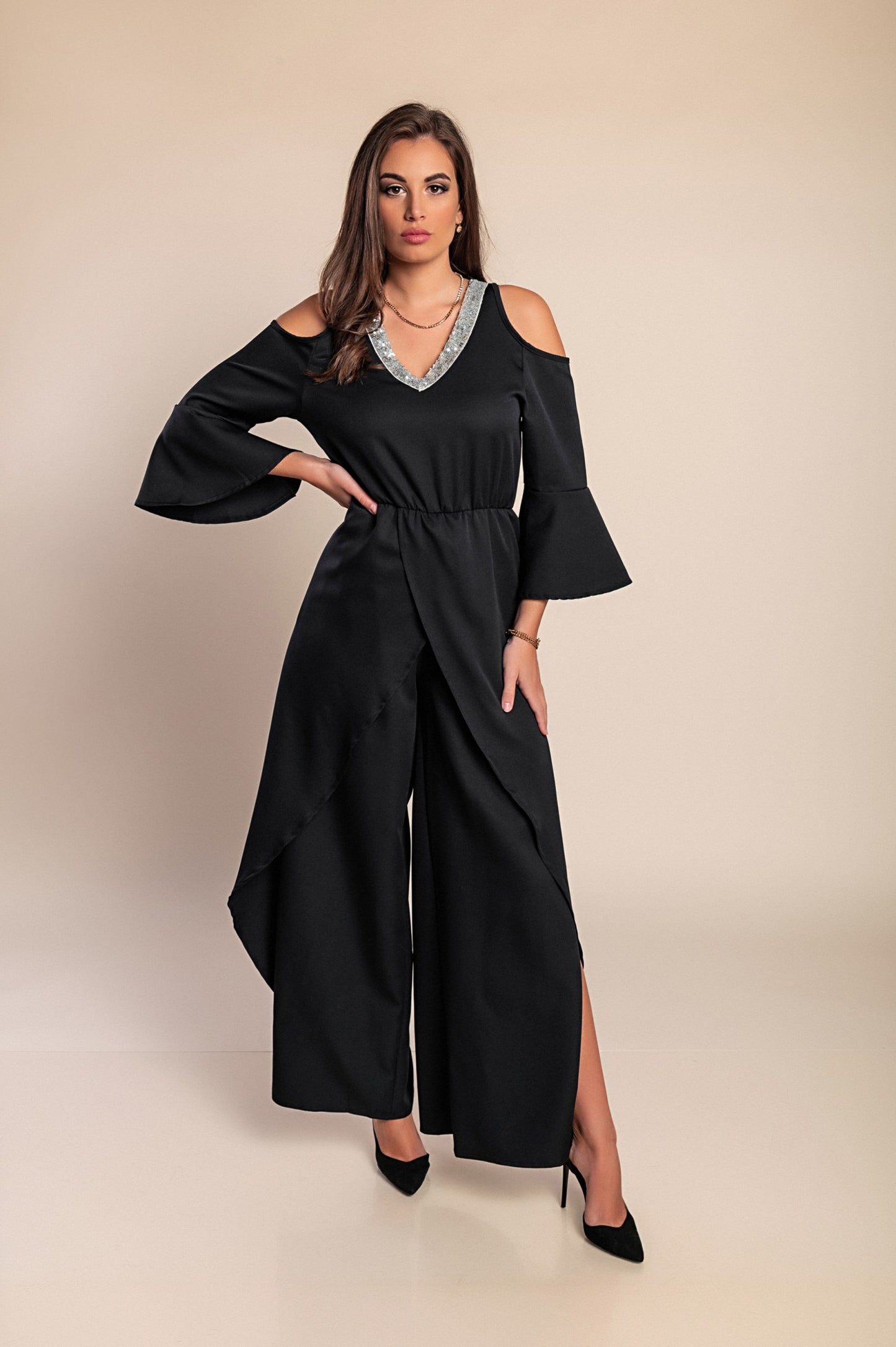 Elegante tuta con paillettes, nera