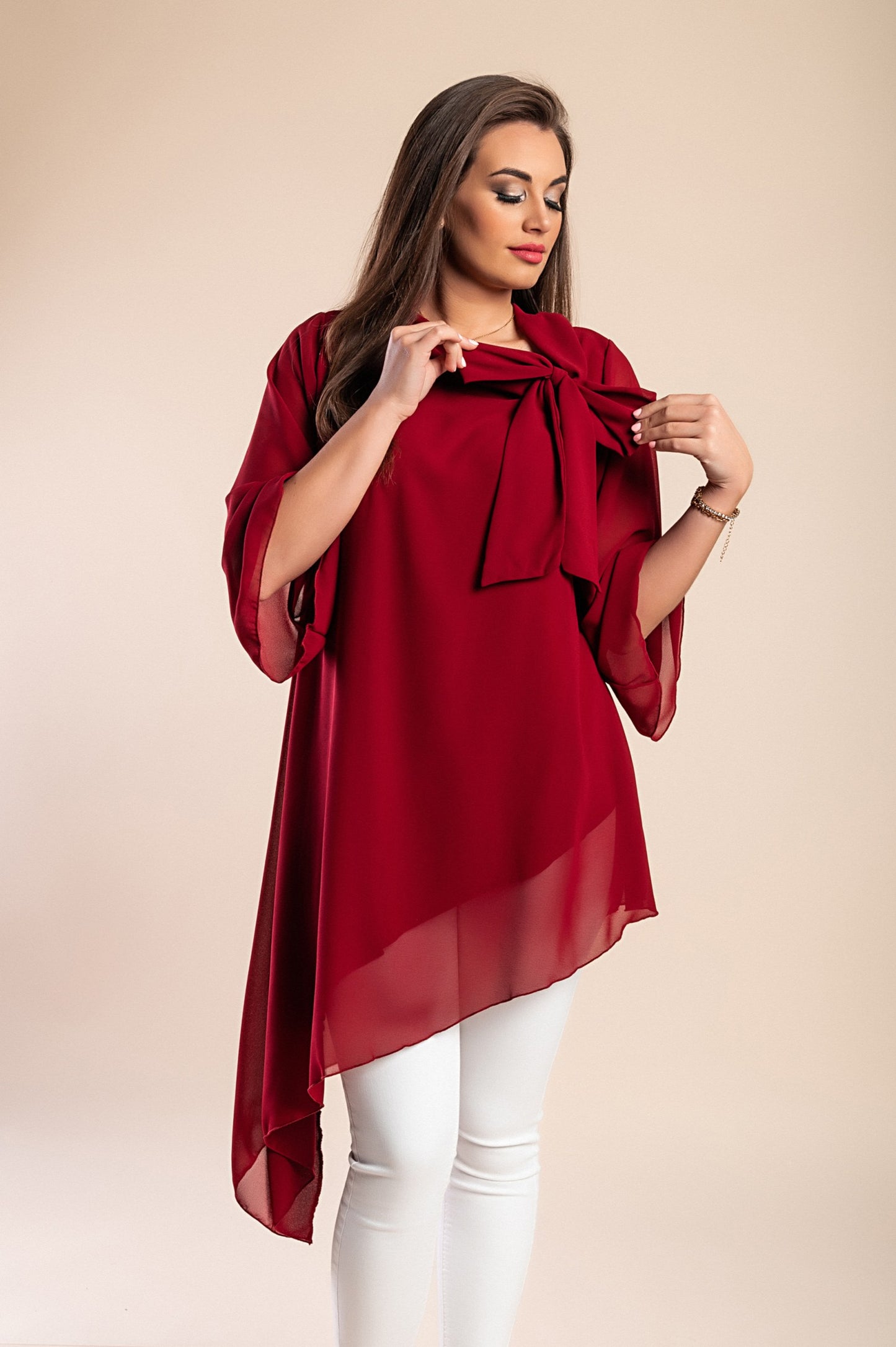 Elegante tunica in tessuto semitrasparente con fiocco decorativo  Ginette, verde scuro