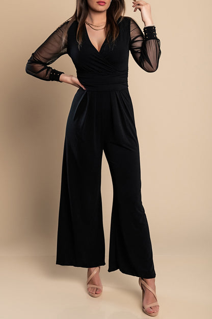 JUMPSUIT ELEGANTE CON SCOLLO A "V" E MANICHE TRASPARENTI CON RIVETTI GEORGINA, NERO
